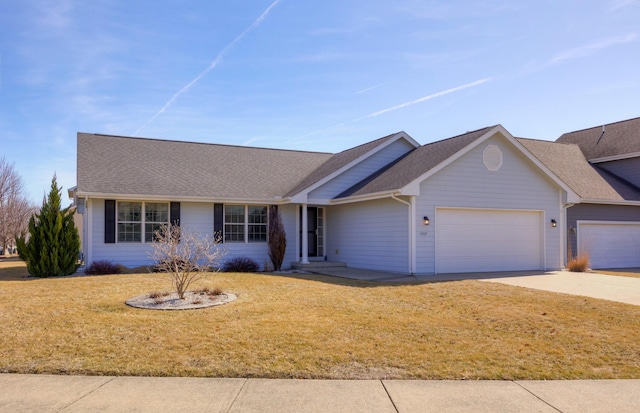 single story home featuring driveway, a front yard, roof with shingles, and an attached garage