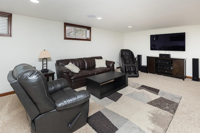 carpeted living room with recessed lighting and baseboards