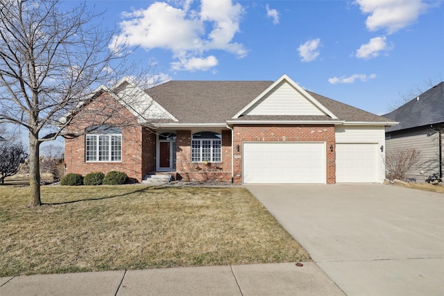 single story home with a front yard, driveway, roof with shingles, a garage, and brick siding