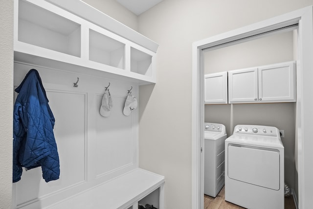 mudroom with washer and dryer