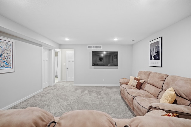 living area with recessed lighting, carpet flooring, visible vents, and baseboards