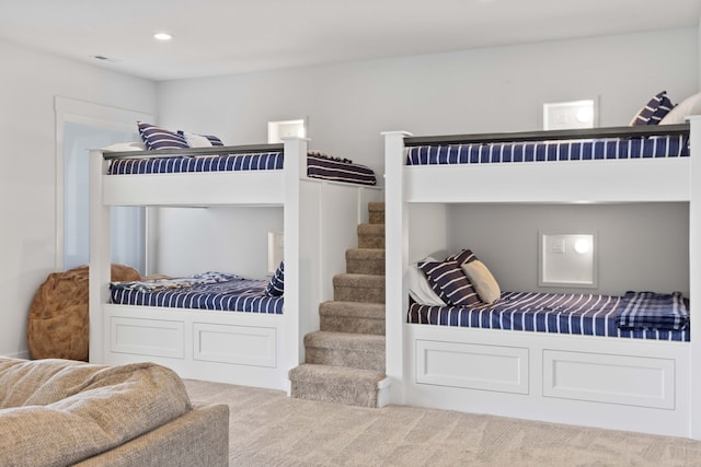 carpeted bedroom featuring recessed lighting