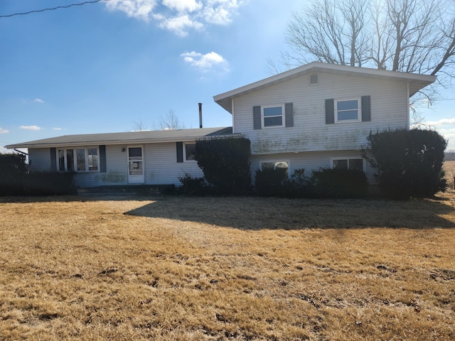 view of front of home with a front lawn