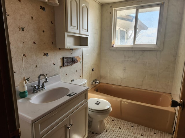 bathroom featuring tile patterned floors, wallpapered walls, toilet, and vanity