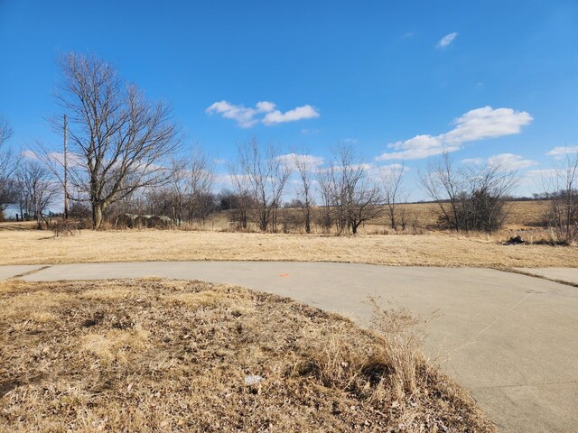 view of street featuring a rural view