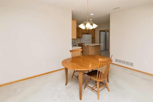 dining area with light carpet, visible vents, baseboards, and a notable chandelier