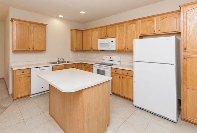 kitchen with white appliances, recessed lighting, light countertops, and a sink