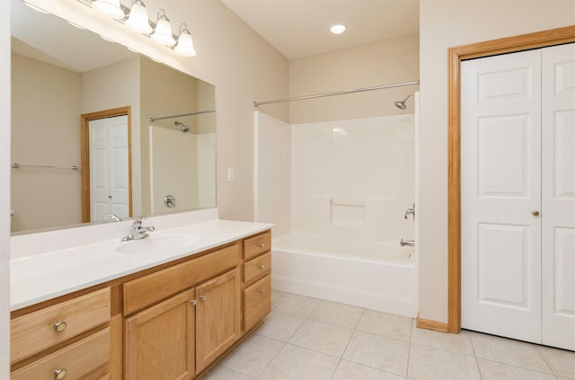 full bath with a closet, bathtub / shower combination, vanity, and tile patterned flooring