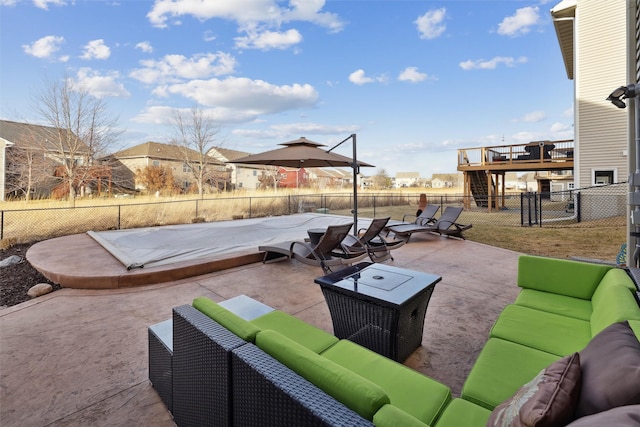 view of patio with an outdoor hangout area and a fenced backyard