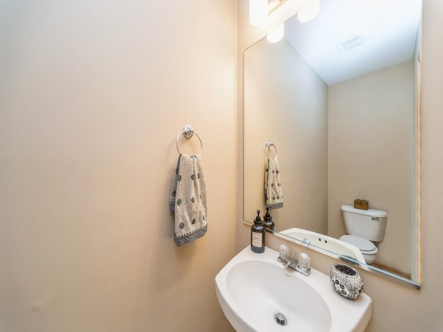 1904 NW Ashton Ln Unit 3, Ankeny, IA 50023 - half bathroom with a sink and toilet
