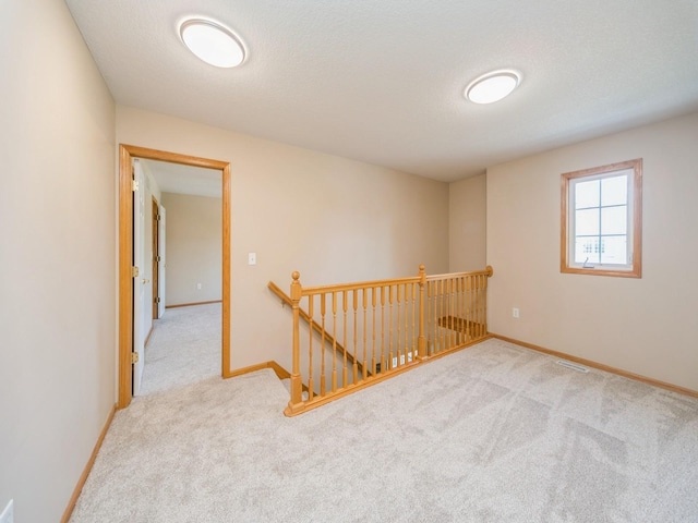 1904 NW Ashton Ln Unit 3, Ankeny, IA 50023 - spare room with carpet and baseboards