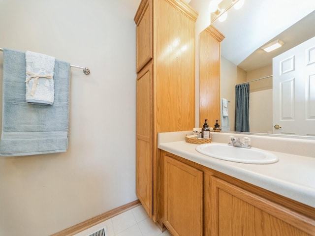 1904 NW Ashton Ln Unit 3, Ankeny, IA 50023 - bathroom featuring vanity, tile patterned floors, and a shower with shower curtain