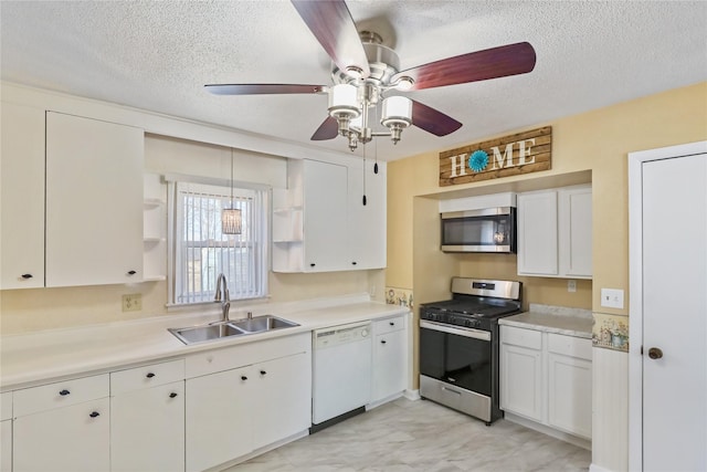 kitchen featuring a sink, open shelves, white cabinetry, appliances with stainless steel finishes, and light countertops