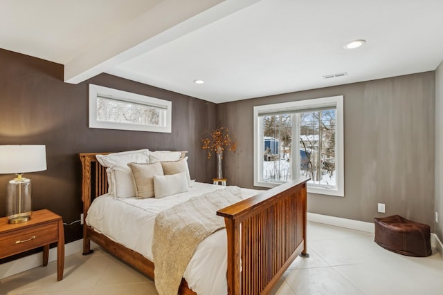 bedroom featuring visible vents, beam ceiling, recessed lighting, light tile patterned flooring, and baseboards