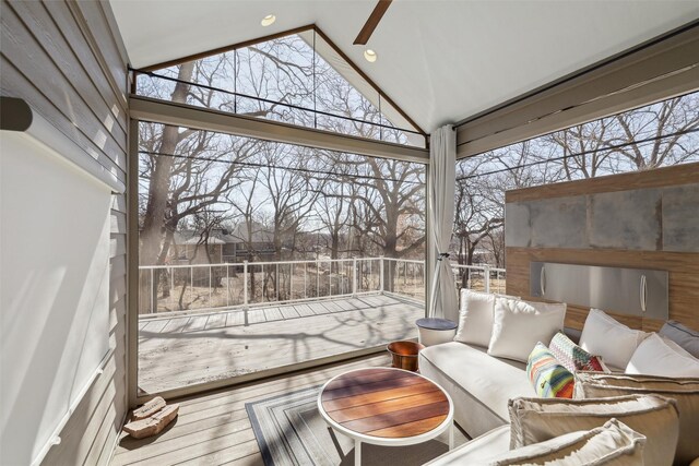 wooden terrace with an outdoor hangout area