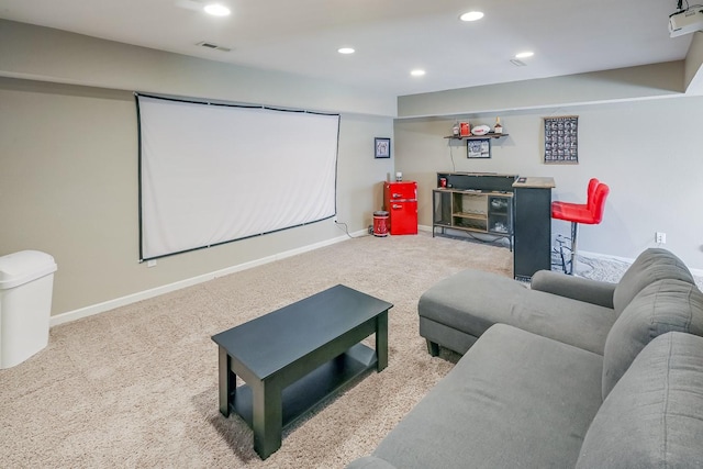 carpeted cinema with visible vents, recessed lighting, and baseboards