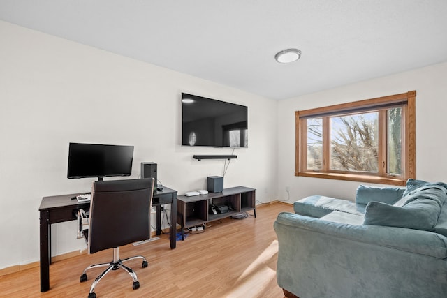 office space featuring light wood-style flooring