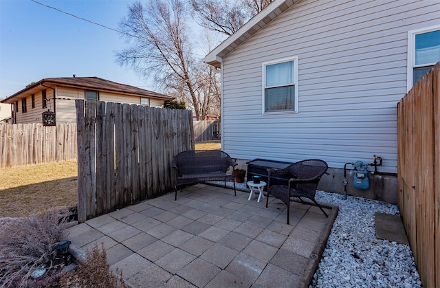 view of patio featuring a fenced backyard