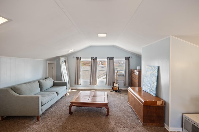 carpeted living room featuring vaulted ceiling