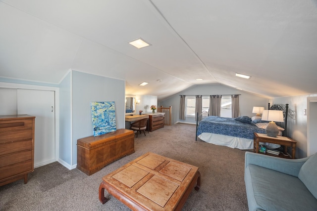 carpeted bedroom featuring vaulted ceiling