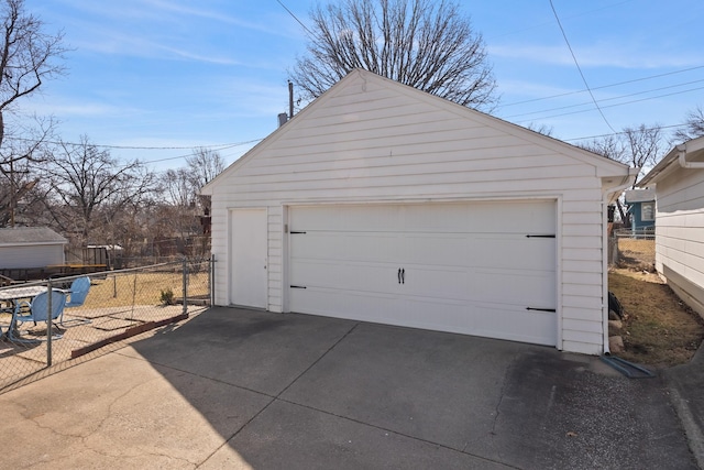 detached garage with fence