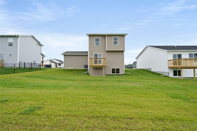1506 E Girard Ave, Indianola, IA 50125 - back of property featuring central AC unit and a deck