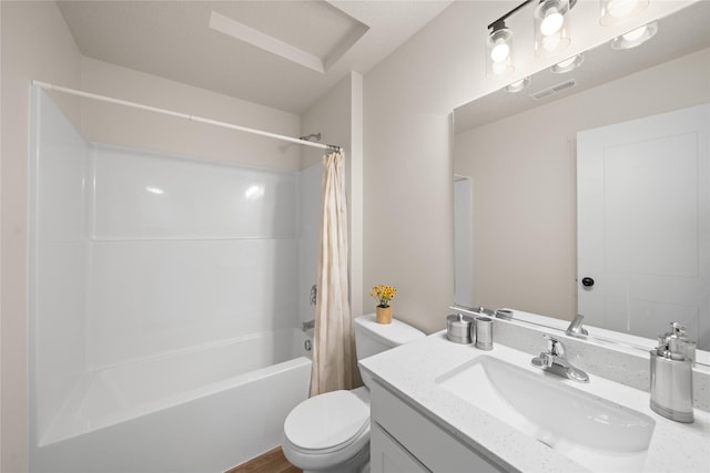 1506 E Girard Ave, Indianola, IA 50125 - bathroom with vanity, shower / tub combo with curtain, and toilet