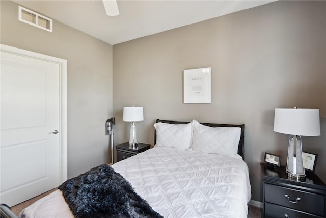 bedroom featuring visible vents