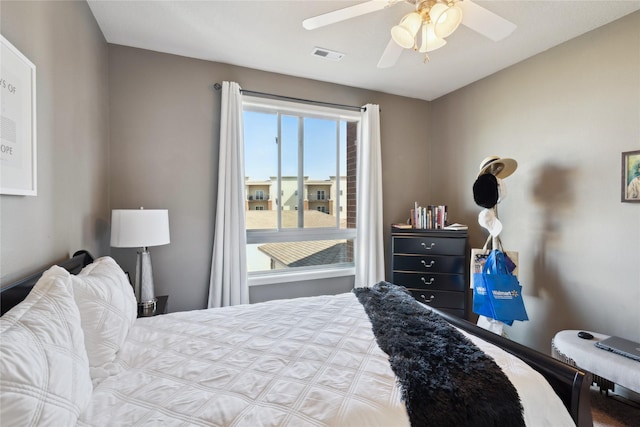 bedroom with visible vents and ceiling fan