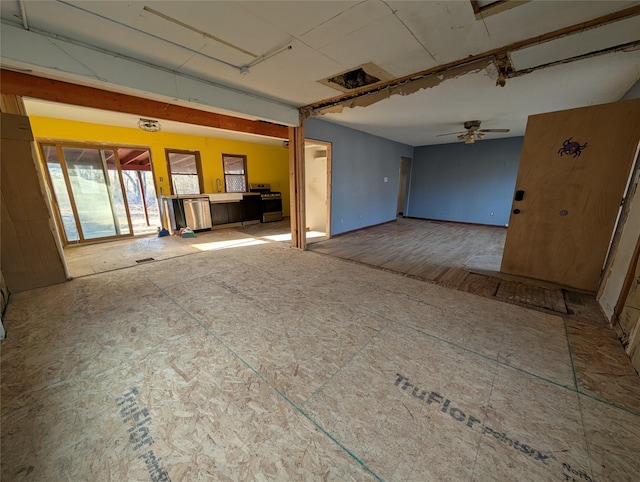 unfurnished room with a ceiling fan