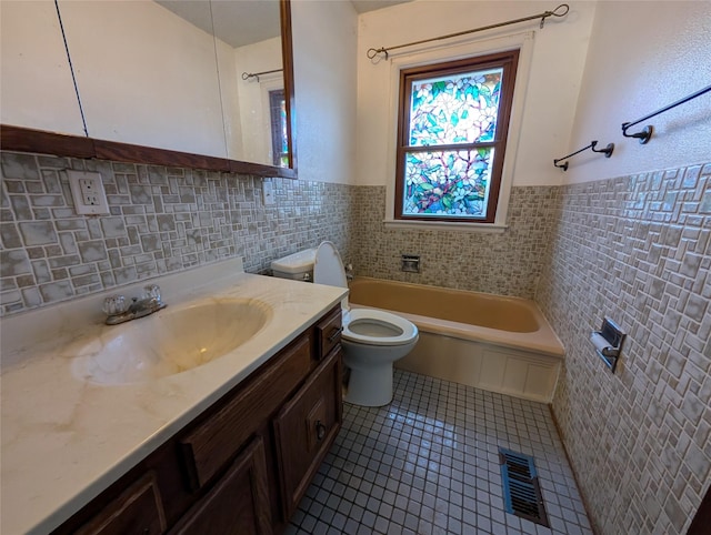 bathroom featuring tile patterned floors, visible vents, toilet, and tile walls