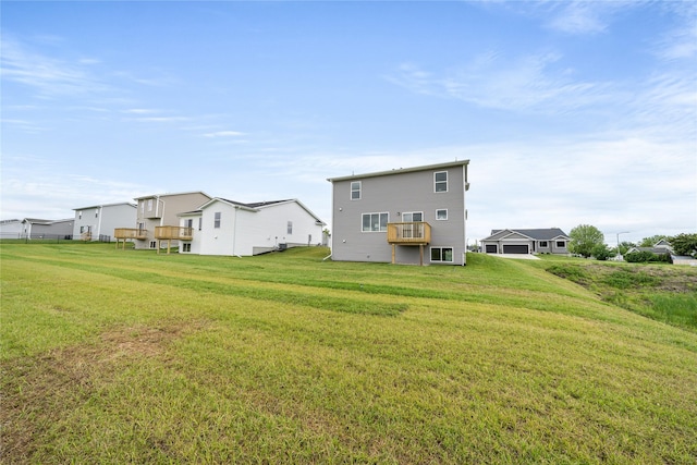 1502 E Girard Ave, Indianola, IA 50125 - rear view of property with a lawn and a residential view