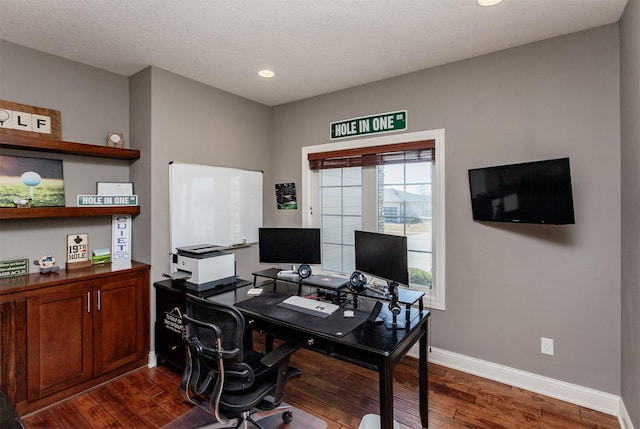 home office with dark wood finished floors, recessed lighting, baseboards, and a textured ceiling