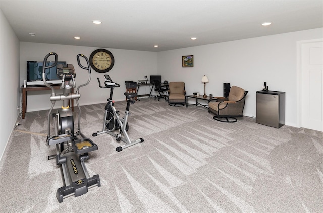 workout room featuring recessed lighting and carpet