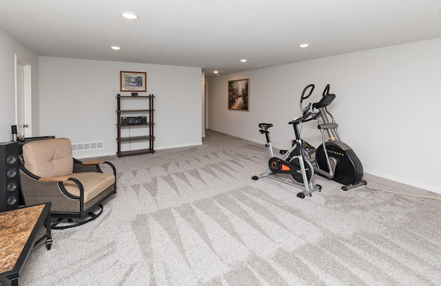 exercise area with visible vents, recessed lighting, baseboards, and carpet