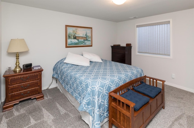 bedroom featuring visible vents and carpet flooring