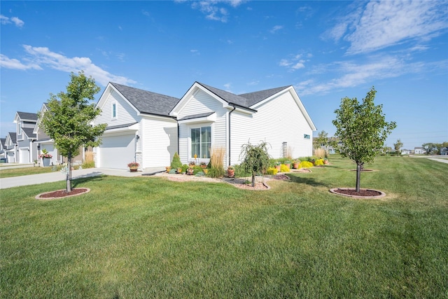 ranch-style home featuring a front lawn, concrete driveway, and a garage