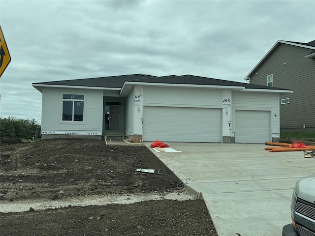 10022 NW 68th Ave, Johnston, IA 50131 - view of front of property with an attached garage, driveway, and a shingled roof