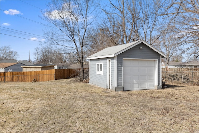 detached garage with fence