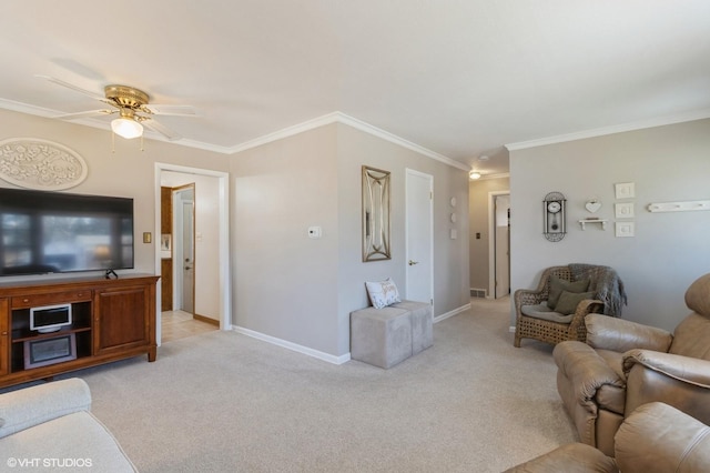 living room featuring crown molding, light colored carpet, baseboards, and ceiling fan