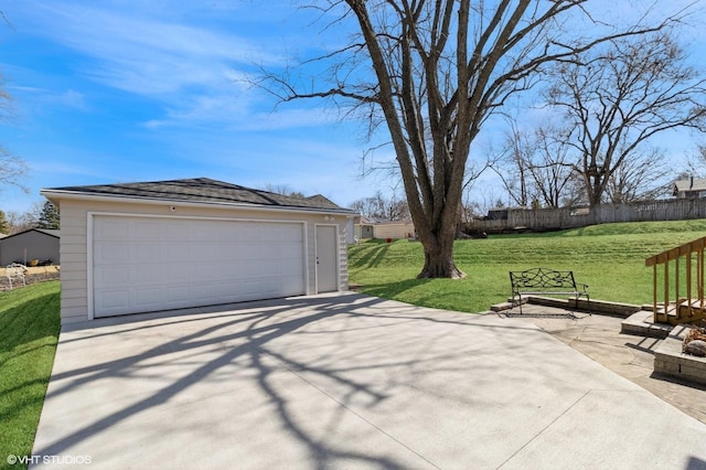 garage with fence