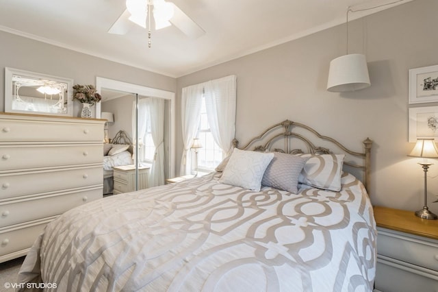 bedroom featuring a ceiling fan and ornamental molding