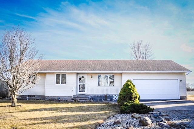 ranch-style house with a front yard, a garage, driveway, and a shingled roof