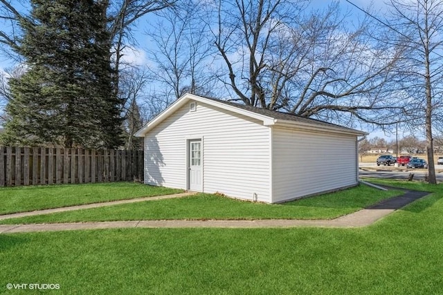 garage with fence