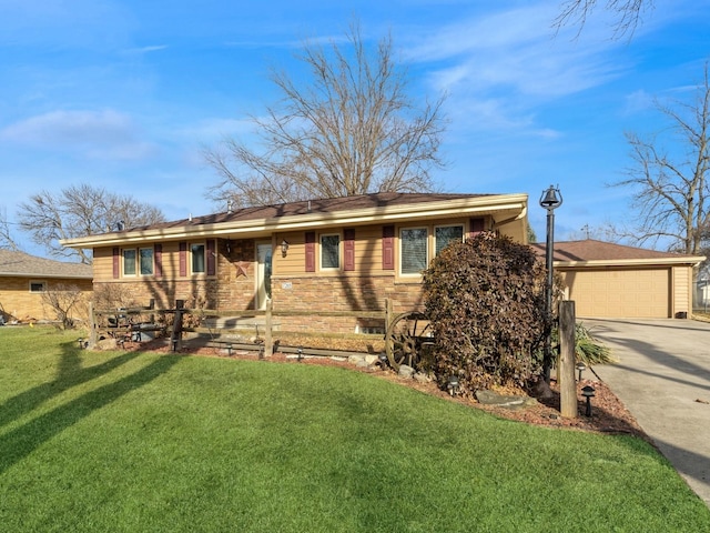 rear view of property featuring a garage, a lawn, and driveway