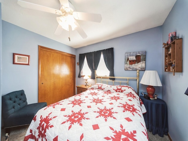 carpeted bedroom with a closet and ceiling fan