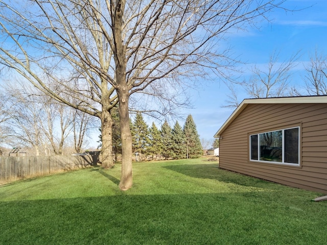 view of yard featuring fence