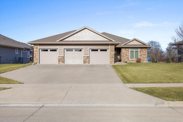 craftsman-style home with a front lawn, cooling unit, a garage, stone siding, and driveway