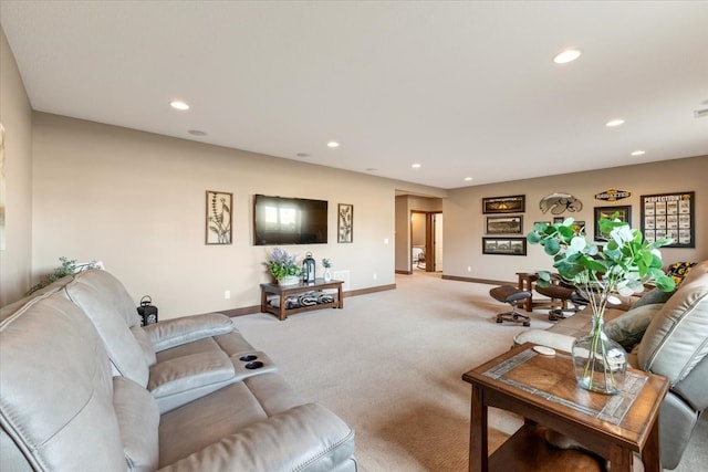 living area featuring visible vents, recessed lighting, baseboards, and carpet floors