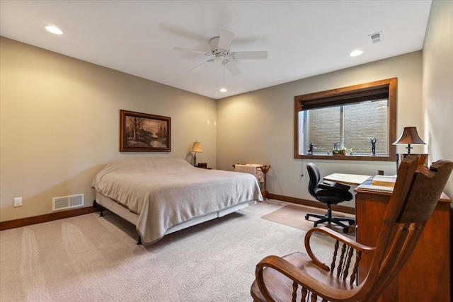 carpeted bedroom featuring recessed lighting, visible vents, and baseboards